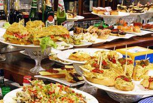 Family enjoying pintxos in a Basque tavern